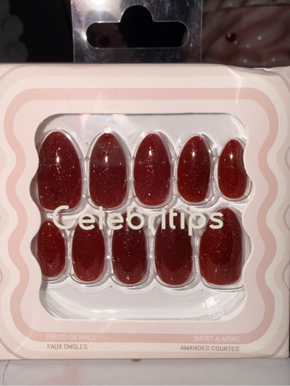 Celebritips “Scarlett” Short Almond Press-On Nails in Sparkling Red